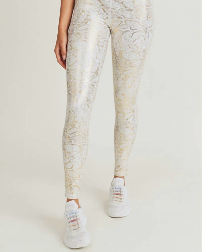 Front of a model wearing a size L Print High-Waisted Legging In Gold Snakeskin in Gold Snakeskin by mono b. | dia_product_style_image_id:358232